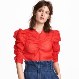 Red blouse puffy sleeves